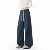 Calça longa masculina de corte oblíquo estilo americano, marca da moda, caimento clean, perna larga solta, calça casual reta, novo modelo 2026