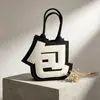 Bolso nuevo de fieltro creativo, mismo estilo que en Xiaohongshu, diseño abstracto de carácter chino, bolso de mano creativo, bolsa de regalo para temporada de graduación