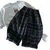 Pantalones para niño Bangcheng 2026 invierno nuevo estilo a cuadros para niños forrados de polar pantalones casuales holgados largos para niños pequeños y mayores dropshipping
