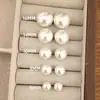 Pendientes de Bollo al Vapor Perla Estilo Mismo Fiebre Blanco Brillante Lujo Accesible Exquisitos de Moda Nicho Pendientes de Moda Simples de Gama Alta