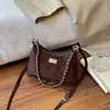 Bolso de cadena de moda 2026 Otoño nueva llegada nicho estilo coreano un solo hombro bandolera alto valor estético moderno elegante bolso cuadrado
