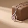 Collar de plata de ley S925 con colgante de gota de perfume de tulipán para mujer, lujo ligero con un toque de alta gama, cadena de clavícula nicho, temperamento suave, colgante de circón azul