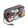 Venta al por mayor de fábrica nueva cartera monedero bolso femenino coreano estampado cartera bolso para teléfono móvil cartera de dama bolso de tela para correr