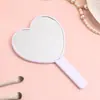 Espejo de mano de alta definición en forma de corazón, lindo espejo de maquillaje portátil para niñas, publicidad de belleza con logo impreso, fábrica de Yiwu