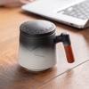 Taza de cerámica de gran capacidad para el hogar, taza de té sencilla con separación de té, taza de oficina ligera de lujo de alta gama con tapa, taza de agua