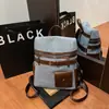 Nueva mochila de viaje ligera estilo japonés transfronteriza para mujer, mochila niche estilo coreano para camping al aire libre, mochila con bloques de color