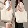 Bolsas de lona personalizáveis de grande capacidade para exportação e comércio transfronteiriço, com impressão de logotipo, e disponíveis como sacolas de compras promocionais ou sacolas de algodão feitas sob medida.