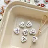 Acrílico pintado a mano Año Nuevo serpiente pequeña elefante pequeño lindo cuentas de amor cuentas sueltas DIY pulsera hecha a mano collar accesorios