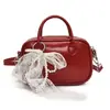 Bolsa de Bolos para Mujer 2026 Primavera Nuevo Estilo Bolso de Hombro Simple y de Moda Bolso Cruzado Popular de Nicho de Alta Gama