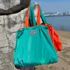 Sacola de Compras Dobrável Bolsa de Viagem para Avião Tecido Oxford Twill à Prova d'Água Bolsa de Armazenamento de Roupas e Bagagem para Viagem e Mudança Estilo Novo