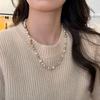 Collar de cadena de suéter vintage de otoño e invierno nuevo, largo, ligero, de lujo, con perlas irregulares y nicho, de moda de alta gama para mujer