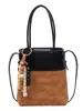 Bolso Retro de Ante Transfronterizo para Mujer 2026 Nuevo Bolso Cruzado de Nicho Moda de Alta Gama Patchwork Bolso Cubo de Moda