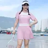Traje de baño para mujer con figura ligeramente curvilínea, talla grande, nuevo modelo de una pieza estilo falda para verano 2026, traje de baño protector solar para vacaciones, al por mayor en stock