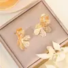 Pendientes Metálicos de Moda Creativa Estilo Ins Calados Corazón Estéreo Forma Geométrica Pétalos Estrella de Cinco Puntas Pendientes de Estilo Simple para Mujer