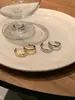 Artículo Versátil con una Textura Sobresaliente, Pendientes de Aro Lisos de Estilo Minimalista, Diseño de Nicho con un Toque de Lujo, Pendientes de Botón Redondos al por Mayor