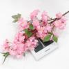 Rama de cerezo artificial flor artificial rama de durazno de plástico flor decorativa de ratán para techo de tienda cerezo de celebridad de internet japonés al por mayor