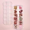 Caja de 12 Joyas para Uñas Calientes con Combinación de Gatito de Cuero Negro de Verano Caja de Materiales para Uñas Artísticas Venta al por Mayor