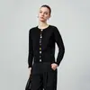 Nuevo Estilo Primavera Temprana 2026 Suéter Negro de Punto de Manga Larga con Cuello Redondo para Mujer con Sentido del Diseño, Botones Coloridos, Elegante, Moderno y Versátil