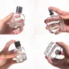 Venta al por mayor desde la fábrica de origen: Botella de Perfume Modelo Nuevo con Cabezal de Bomba de Spray a Juego, Botella de Perfume Vacía de Vidrio Transparente Cuadrada Plana con Forma de Cocodrilo