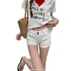 Shorts jeans ultra-curtos estilo retrô americano de cintura baixa que realçam o quadril para mulheres, novo estilo verão 2026, hot pants sexy de barra dobrada que afinam e abraçam o quadril