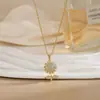 Colar para Mulheres, Flor de Zircônia Bauhinia Giratória da Moda Nicho Moda Novo Design Pingente Titânio Aço Colar de Temperamento