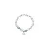 Pulsera de Piedra Ojo de Gato Imitación, Diseño de Nicho, Accesorio de Mano Simple y Elegante para Mujer, Nueva Pulsera de Alta Gama de Moda 2026
