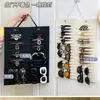 Bolsa colgante de fieltro para pinzas de pelo, pendientes y joyas; Bolsa de Almacenamiento para Colgar en la Pared para Pendientes, Collares y Accesorios