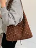 Nova bolsa tote Yuezhi 2026 outono inicial, textura simples de bolinhas, bolsa de mão e ombro versátil de alta qualidade em veludo cotelê