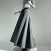Falda de mujer de otoño e invierno nueva, de cintura alta, con dobladillo amplio, versátil, casual, holgada, de longitud media