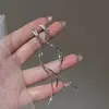 Nuevos pendientes de hilo ondulado para orejas, estilo vacacional de verano para mujer, diseño de nicho de lujo ligero, pendientes largos con borlas, elegantes colgantes para orejas
