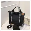 Bolsa de Lona Transfronteiriça para Mulheres, Versátil para o Verão, Nova Bolsa Transversal Casual 2026, Bolsa Tote da Moda Tendência Este Ano