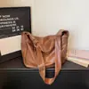 Bolsa Feminina Transfronteiriça Tendência Grande Capacidade 2026 Nova Primavera Versátil Casual Bolsa Transversal Couro Macio Bolsa de Ombro Formato Bolinho