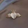 Broche Elegante de Pedra Olho de Gato com Laço para Lapela Feminino, Versátil e Fofo, Previne Exposição, Prende Golas Modernas