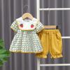 Ropa de verano para niños estilo extranjero nueva niñas dulce lindo fresa cuadros manga corta shorts conjunto de dos piezas de una generación de cabello
