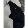 [Destacado] Yuran 26 Nueva Colección de Principios de Otoño: Conjunto de punto con hombro asimétrico y manga larga, mezcla de acetato, con falda midi de abertura lateral