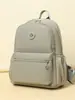 Mochila casual transfronteriza para mujer 2026 modelo nuevo de otoño bolsa de nailon simple versátil ligera mochila de moda para damas