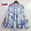 Top de ganchillo tie-dye estilo étnico Guangxi hueco tejido con borla colgante cinturón de condole tie-dye top pequeño al por mayor