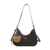 Bolso de axila retro con forma de media luna para mujer, nueva colección principios de otoño 2026, diseño de nicho, alto atractivo estético, bolso de hombro simple, bolso cruzado, estilo transfronterizo