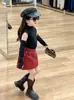 Otoño 2024 Nueva Ropa Infantil Coreana Niñas Spice Girls Cuello Alto Nudo en la Espalda Camiseta Básica Falda Corta Falda de Cuero