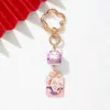 Amuleto estilo INS gato de la suerte de cerámica flor de ciruelo llavero colgante metálico decoración para bolso para buena suerte y salud