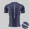 Ropa de Fitness al por Mayor para Hombre, Running, Entrenamiento de Maratón, Atletismo, Deportes de Verano, Secado Rápido, Transpirable, Camisetas Deportivas de Manga Corta