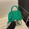 2026 Invierno Nuevo de Moda Versátil Simple Casual Elegante Texturizado Bolso de Hombro Cruzado Bolso de Concha