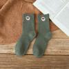 Calcetines de mujer otoño e invierno nuevos en el tubo de color sólido cálido terciopelo acolchado calcetines de invierno de rizo calcetines de toalla de invierno para mujer
