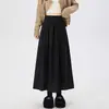 Saia midi plissada de veludo cotelê, elegante e versátil, para mulheres, novo estilo outono e inverno 2026, com barra ampla