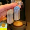 Pendientes de borla larga arqueados de alta calidad de oro de 24k estilo europeo y americano, cadena de engaste de industria pesada, joyería de pendientes de socialité
