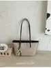 Bolsa de mão pequena muito estilosa para mulheres, novo modelo 2026, bolsa de ombro e transversal de alta qualidade estilo coreano, bolsa de mão tipo saco com design de nicho