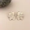Brincos Redondos Florais Geométricos de Agulha de Prata Transfronteiriços Europeus e Americanos Estilo Minimalista Simples Moderno Brincos de Nicho de Alta Qualidade