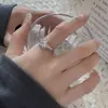 Nuevo anillo de cobre estilo europeo y americano con incrustaciones completas de diamantes, diseño abierto ajustable, moderno y de alta gama, popular en redes sociales, adecuado para el dedo índice