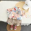 Comercio exterior transfronterizo ropa infantil verano nuevo chico guapo dibujos animados solapa cuello mao de un solo botón camisa traje casual de moda para niños