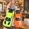 Llavero creativo de mini coche deportivo de fricción, coche de aleación con puertas que se abren, accesorio para mochila infantil, regalo de coche